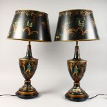 A LARGE PAIR OF TOLE WARE URN SHAPED LAMPS, black ground with chinoiserie decoration, with