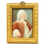 A GEORGIAN MINIATURE PORTRAIT OF A MAN, half-length with wig and holding papers. Signed. 4ins x