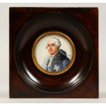 A GOOD CIRCULAR PORTRAIT MINIATURE OF LOUIS XVI, monogrammed F.L. 1.5ins diameter.