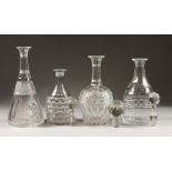 FOUR VARIOUS DECANTERS.