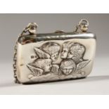 A LADIES SILVER PURSE, repousse with angel head. Birmingham 1905.