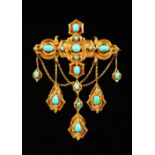 A VICTORIAN GOLD AND TURQUOISE BROOCH, dated 1854.