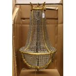 A GOOD ORMOLU AND CUT GLASS CHANDELIER. 26ins high x 15ins wide.