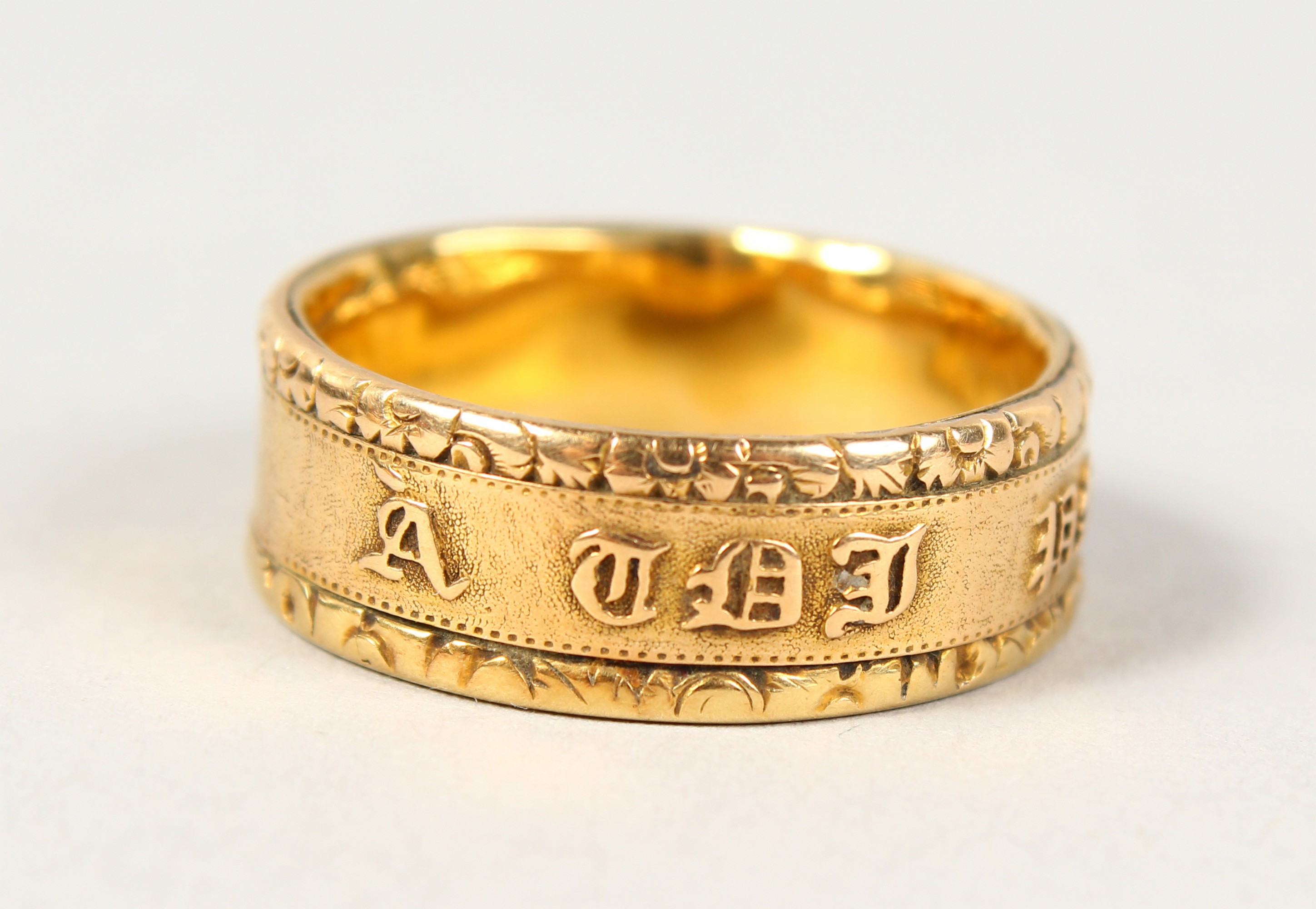 A 22CT GOLD WEDDING BAND, another gold ring with an inscription (2). - Image 2 of 11