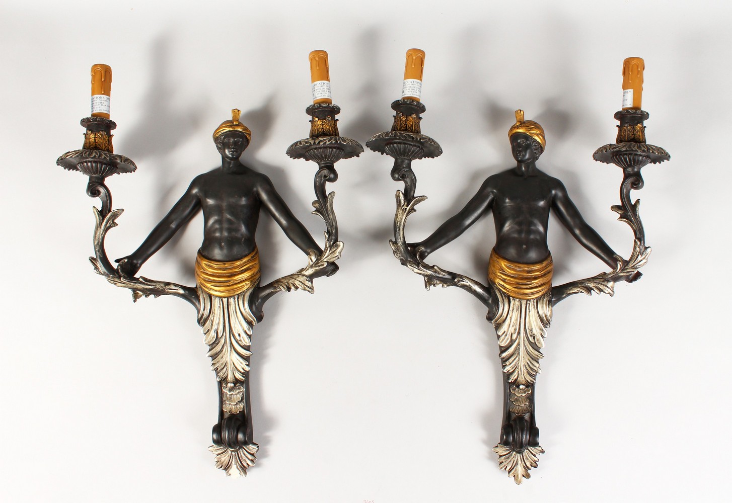 A PAIR OF BLACKAMOOR TWO-LIGHT WALL SCONCES.