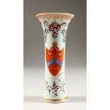 A SAMSON OF PARIS BUD VASE, decorated with flowers. 6ins high.