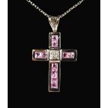 A 9CT GOLD, PINK SAPPHIRE AND DIAMOND CROSS AND CHAIN.