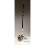 A SWEDISH SILVER PUNCH LADLE, with turned wood handle. 16ins long.