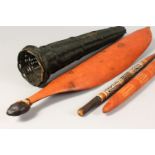 A GROUP OF ABORIGINAL ITEMS, comprising a basket, spear thrower and spears.