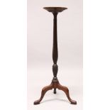 A GEORGE III DESIGN MAHOGANY TORCHERE, with a circular top, wrythen fluted column support, on