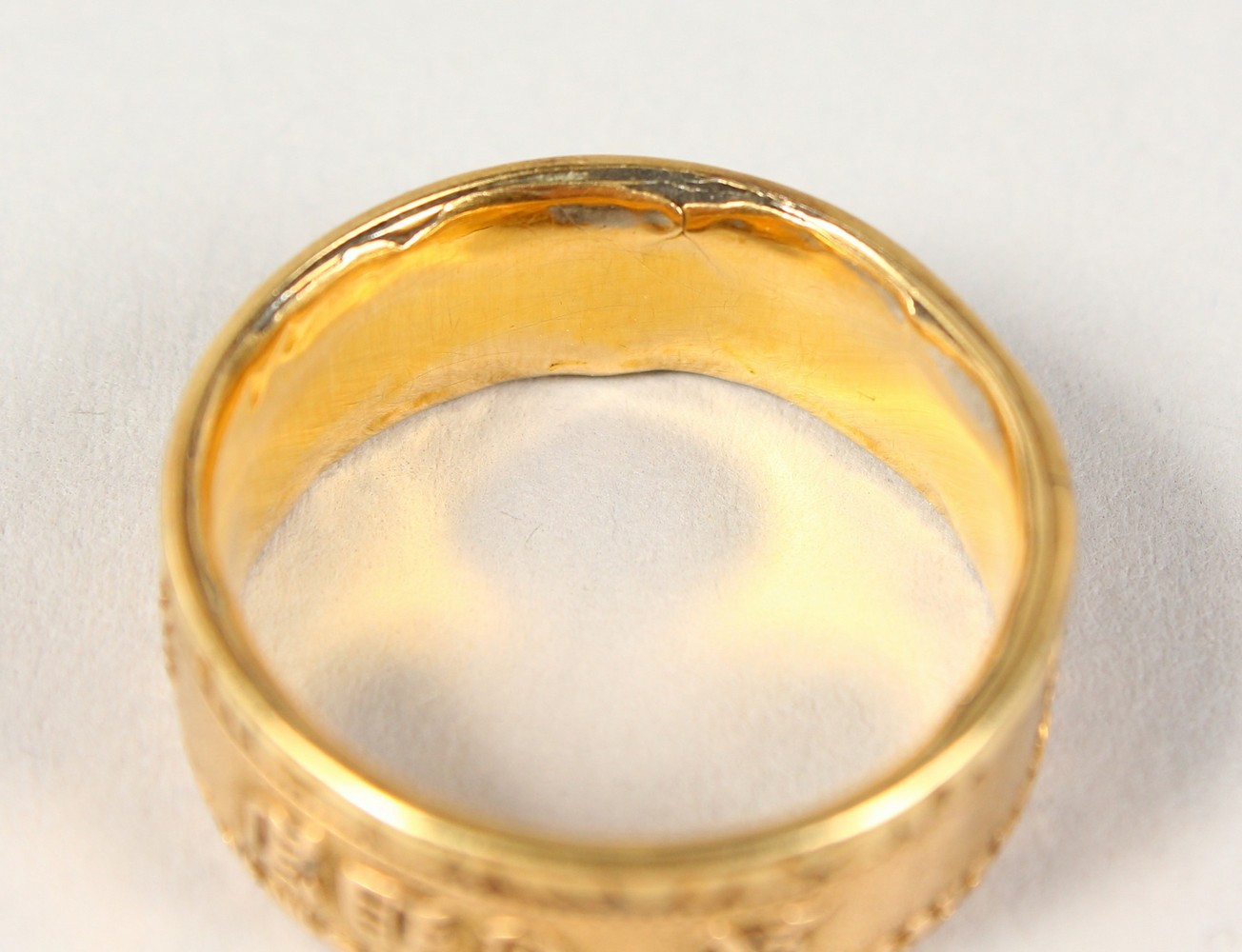 A 22CT GOLD WEDDING BAND, another gold ring with an inscription (2). - Image 7 of 11