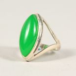 A SILVER AND JADE RING.