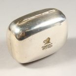 A WHITE METAL TOBACCO BOX, with hinged lid engraved with an armorial and initials. 3.25ins wide.