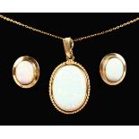 A 9CT GOLD GILSON OPAL PENDANT AND CHAIN and EARRINGS.