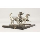 A PAIR OF SILVERED CAST METAL MODELS OF DOGS, on marble bases. 5ins wide.