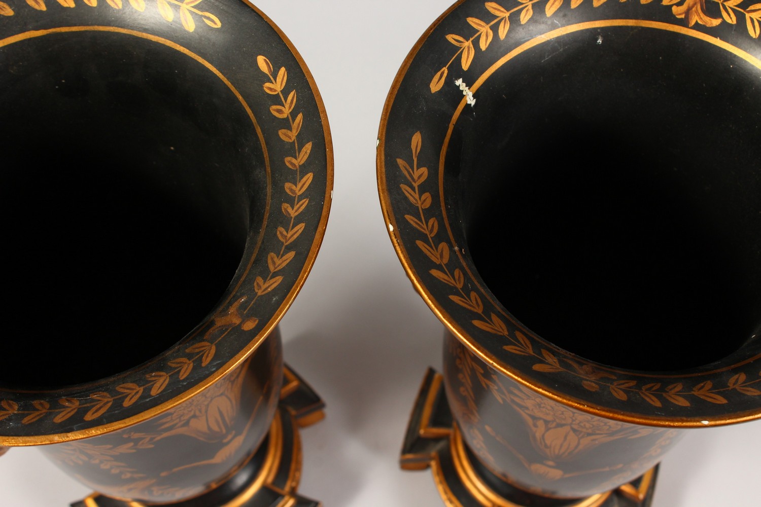A PAIR OF BLACK PORCELAIN TOLEWARE TYPE URNS ON STANDS. 13ins high. - Image 3 of 3