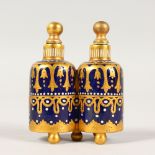 A DOUBLE BLUE AND GILT SCENT BOTTLE AND STOPPER. 2.75ins high.