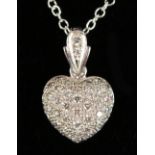 AN 18CT WHITE GOLD DIAMOND SET HEART SHAPED PENDANT NECKLACE.