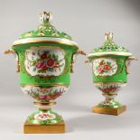 A GOOD PAIR OF SEVRES DESIGN APPLE GREEN URN SHAPED VASES, with pierced covers, with gilt decoration