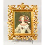 HALF-LENGTH WATERCOLOUR PORTRAIT OF A YOUNG GIRL, in a pierced ITALIAN GILTWOOD FRAME. 17ins x