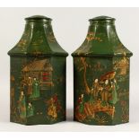 A PAIR OF TOLE WARE GREEN OCTAGONAL TINS, with Chinese designs. 15ins high.
