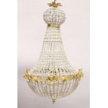 A LARGE CRYSTAL BEAD CHANDELIER. 38ins high.