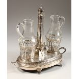 A GOOD 18TH/19TH CENTURY CONTINENTAL SILVER DOUBLE BOTTLE STAND, with two cut glass jugs, engraved