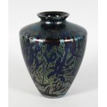 A LOETZ STYLE IRIDESCENT BLUE VASE. 7.5ins high.