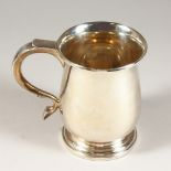 A PLAIN PINT TANKARD. London 1941. Weight 10ozs.