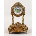 A VERY GOOD RUSSIAN SILVER GILT MUSICAL CLOCK, set with semi-precious stones, the face painted