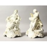 A PAIR OF BERLIN WHITE PORCELAIN GROUPS OF A GALLANT AND LADY, sitting in chairs. 7.5ins high.