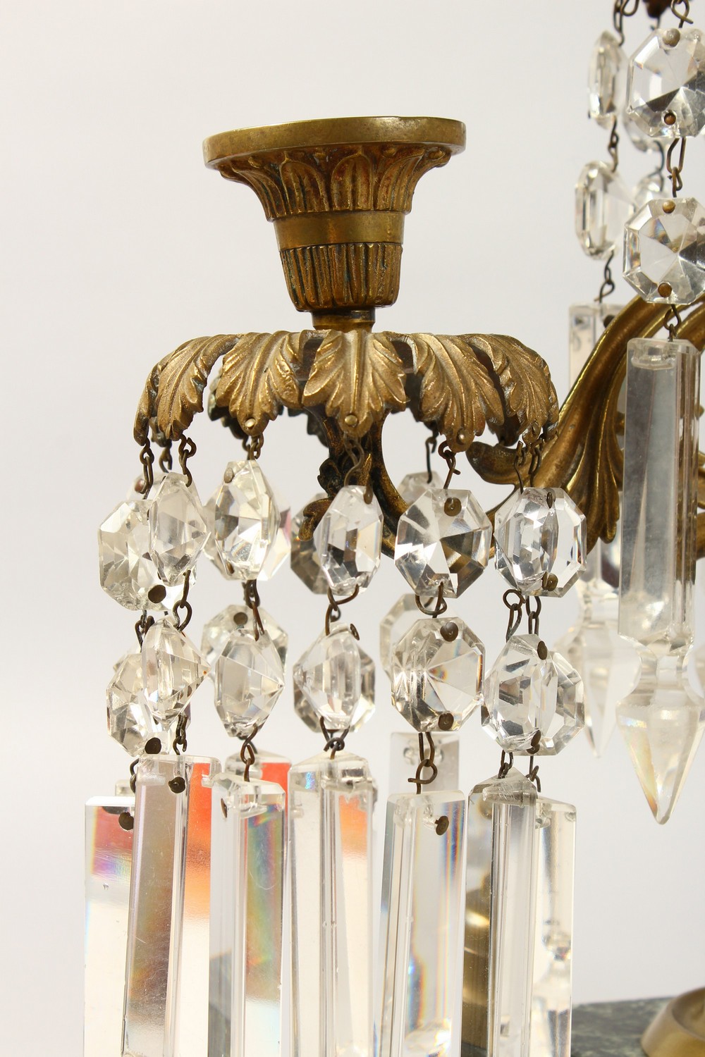 A GOOD PAIR OF 19TH CENTURY THREE-LIGHT CANDLESTICKS, all with prism drops, supported on square - Image 2 of 4