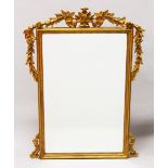 A 19TH CENTURY GILTWOOD PIER MIRROR, with carved and gesso applied leaf decoration. 3ft 3ins high