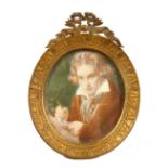 AN OVAL MINIATURE OF BEETHOVEN. 2.25ins x 2ins, in a gilt metal frame.