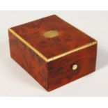 A SMALL BRASS BOUND BURR WOOD BOX. 2.75ins wide.