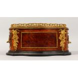 A FRENCH KINGWOOD OVAL SHAPED PLANTER, with ormolu mounts and rams masks. 13ins long.
