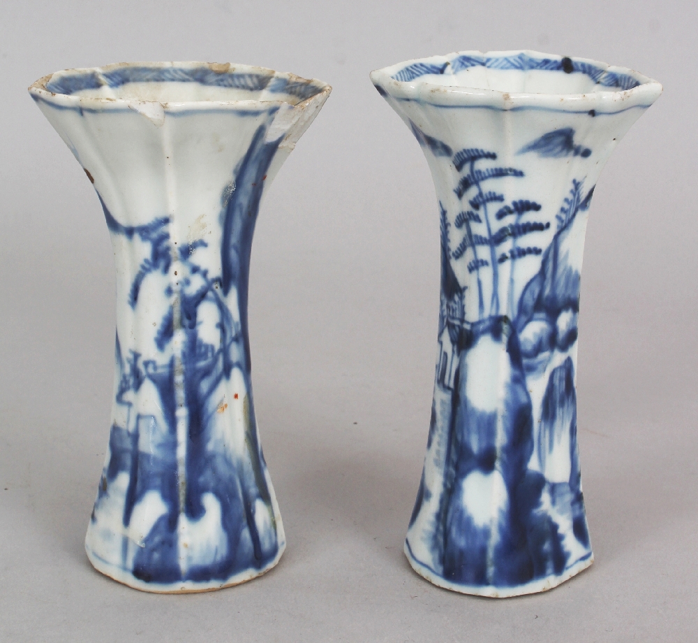 A SMALL PAIR OF CHINESE KANGXI PERIOD BLUE & WHITE PORCELAIN BEAKER VASES, circa 1700, of barbed