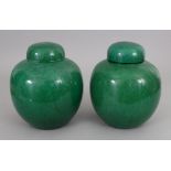 A PAIR OF 19TH/20TH CENTURY CHINESE APPLE GREEN CRACKLEGLAZE PORCELAIN JARS & COVERS, 6.1in wide