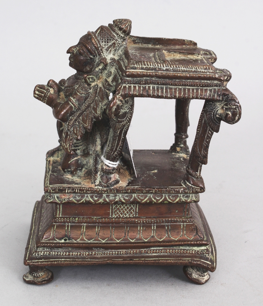 A Bronze Base from a Vishnu Shrine, Tamil Nadu, South India, 19th century, depicting a crouching - Image 4 of 6