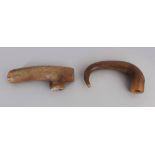 TWO EARLY 20TH CENTURY CARVED HORN WALKING STICK HANDLES, possibly Rhinoceros horn, 4.4in & 4.8in