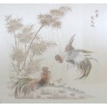 AN EARLY 20TH CENTURY FRAMED CHINESE SILK EMBROIDERY OF TWO FIGHTING COCKERELS, the frame 25.5in