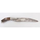 A 19TH CENTURY SRI LANKAN CEYLONESE PIHA KAETTA SILVER-METAL ONLAID STEEL BLADED DAGGER, the wood