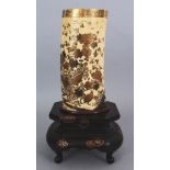 A FINE QUALITY JAPANESE MEIJI PERIOD LACQUERED IVORY TUSK VASE, together with a thin fixed wood base
