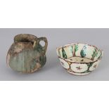 Two Small Islamic Vessels, 13th century and later, comprising a Kashan turquoise glazed jug with