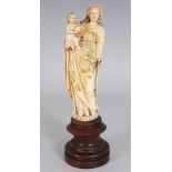 ANOTHER LARGER GOOD 18TH CENTURY GOANESE IVORY CARVING OF THE VIRGIN MARY, mounted on a fixed wood