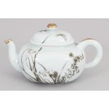 A GOOD QUALITY JAPANESE GRISAILLE DECORATED PORCELAIN TEAPOT & COVER, circa 1900, the base unglazed,