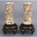 A PAIR OF FINE QUALITY SIGNED JAPANESE MEIJI PERIOD IVORY TUSK VASES, on fixed lacquered wood