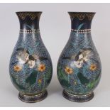 A GOOD PAIR OF MID/LATE 19TH CENTURY JAPANESE MEIJI PERIOD CLOISONNE VASES, each pear-form body