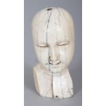 A FINE QUALITY 18TH CENTURY CHINESE EXPORT CARVED IVORY DOLL’S HEAD, the features finely carved, 3.