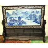 A VERY LARGE CHINESE BLUE & WHITE PORCELAIN AND HARDWOOD FLOOR SCREEN, the porcelain decorated